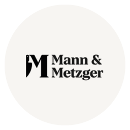 Mann & Metzger logo.